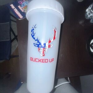 bucked up white shaker bottle with american flag logo